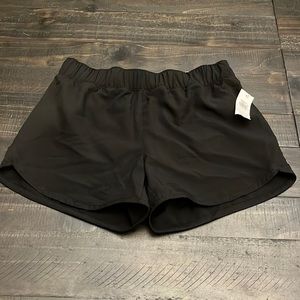 Brand new with tags- girl’s athletic shorts in Large (10-12)